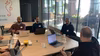 Attendees at a table for contribution day